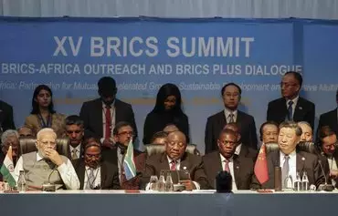 First row from L to R: Prime Minister of India Narendra Modi, South African President Cyril Ramaphosa, Deputy President of South Africa Paul Mashatile and President of China Xi Jinping attend a meeting during the 2023 BRICS Summit in Johannesburg on August 24. [Marco Longari/POOL/AFP]