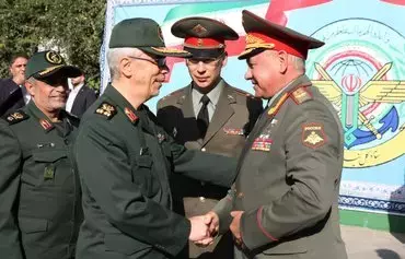 Russian defense minister Sergei Shoigu meets with Iranian armed forces chief of staff Maj. Gen. Mohammad Bagheri in Tehran on September 19. [Defa Press]