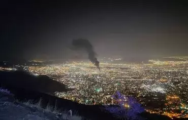 Smoke billows above Tehran from a fire in a defense ministry warehouse on September 22. [Mashregh]