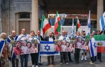 A group of Canada-based Iranians gather in Vancouver to show their support for Israel on October 11. They carry Israeli flags and Iran's Lion and Sun flag (the pre-1979 flag). [Social media]