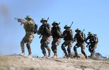 Members of the Ezzedine al-Qassam Brigades, the military wing of Hamas, training at an undisclosed location in early September. [Ezzedine al-Qassam Brigades]