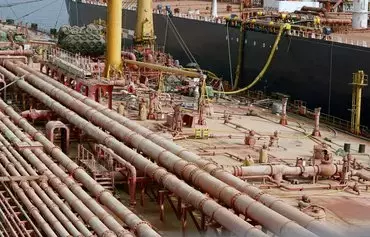 Oil from the tanker FSO Safer (L) is transferred to the UN-purchased vessel Nautica in the Red Sea off Yemen's al-Hodeidah on July 25, 2023. The Houthis' attacks on Red Sea shipping have stalled the Safer operation. [AFP]