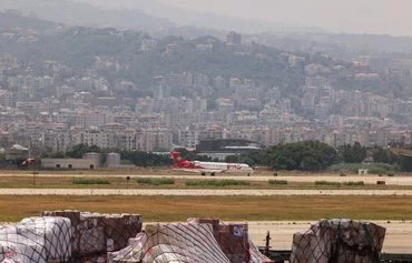 A photo taken during a media tour organized by the Lebanese Ministry of Public Works and Transport shows a plane taking off from the cargo runway at Beirut's international airport on June 24. [Anwar Amro/AFP]