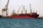 
A ship is docked for unloading in Yemen's Houthi-held port of al-Hodeidah on July 15, 2023. [Mohammed Huwais/AFP]        