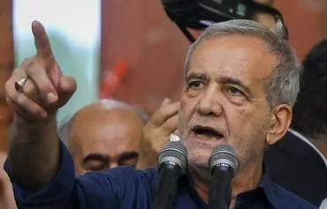 Newly elected Iranian President Masoud Pezeshkian speaks during a visit to the shrine of the Islamic Republic's founder, Rouhollah Khomeini, in Tehran on July 6. [Atta Kenare/AFP]