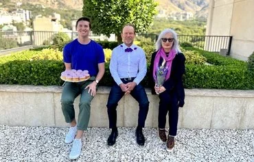 The Australian Embassy in Tehran posted this photo of Ambassador Ian McConville (center) with embassy staff on September 1, in celebration of 'Wear it Purple Day.' [Australian Embassy/Instagram]