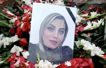 A photgraph of Sara Deldar is displayed on her grave in Rasht, Iran. [File]