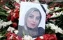 
A photgraph of Sara Deldar is displayed on her grave in Rasht, Iran. [File]        