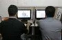 
Internet users at a Tehran cybercafe, May 14, 2013. [Atta Kenare/AFP]        