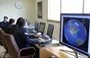 
Personnel monitor satellite signals at the Alborz Space Station in Mahdasht, Iran, February 29, 2012. [Atta Kenare/AFP]        