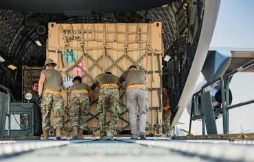 US Air Force aerial porters load THAAD support equipment being sent to Israel onto a military transport aircraft on October 16, 2024. [US Air Force]