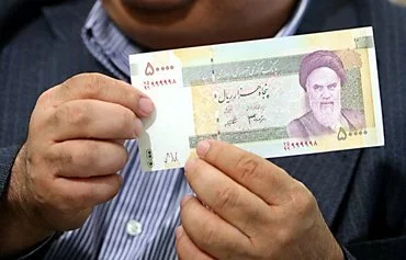 Iran's central bank displays a 50,000 rial note in Tehran in 2007, then worth about $5. [IRNA/AFP]