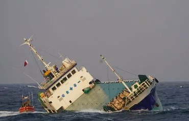 M/V Shayesteh sinks in Gulf waters on February 18. The US Navy and Coast Guard rescued its seven-member crew, comprised of Iranian and Indian nationals. [CENTCOM]