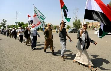 In Houthi-controlled Sanaa, Yemenis march in support of Gaza on June 10, 2024. The Houthis have been accused of exploiting Palestinian suffering for their own gain. [Mohammed Huwais/AFP]