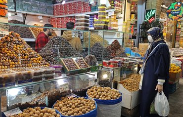 Iranian families struggle as wages collapse, prices soar