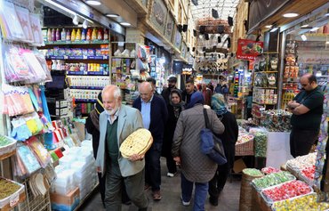 Iranian hardliners hide economic collapse behind conspiracy theories